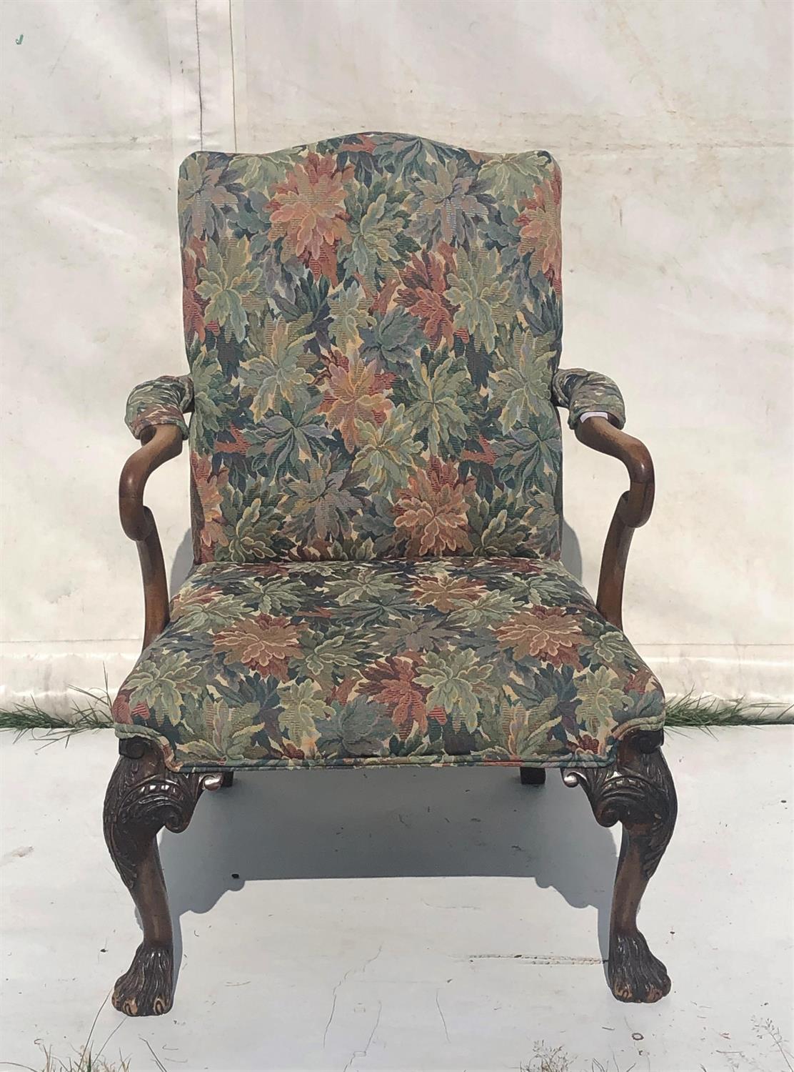 George III style mahogany open arm chair, the shaped upholstered back and shepherd's crook arms on