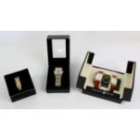 Four modern fashion watches, comprising a Pierre Cardin gentleman's bi-metal wristwatch in box,,