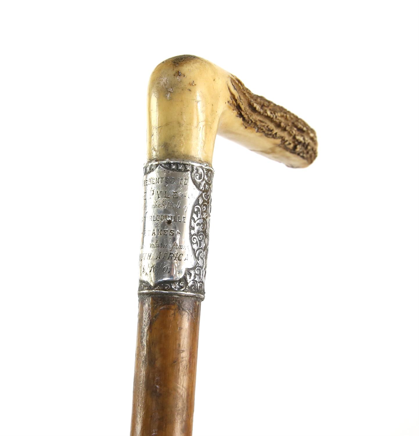 Silver mounted presentation walking stick with antler handle, (Presented to E. Pyle by the