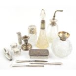 Selection of thirteen silver mounted/topped dressing table items