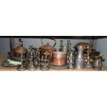 Graduated set of seven copper cooking pans, kettles, pewter wares including candlesticks,