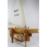 Radio controlled model pond yacht 'WN7' 71 cm long, on stand,