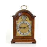 Miniature walnut bracket timepiece clock, with brass dial, the arch inscribed Chas.