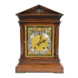 German oak cased twin train mantel clock, with subsidiary seconds dial and chime/silent dial, H40.