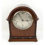 Maples mahogany triple train mantel clock, with Roman numerals,