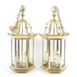 Pair of brass and glass hall lanterns, each with three lights, 54 cm high (2)