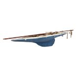 Scratch built painted wooden model pond yacht with single mast, 126cm long, on stand,