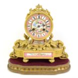 French gilt-metal and pink porcelain mounted mantel clock, the floral painted drum dial over