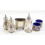 Selection of six silver cruets including a pair of pierced salts with blue glass liners,