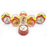 Three German Bradley Mickey Mouse alarm clocks, Minnie Mouse alarm clock and two Hungarian Mickey