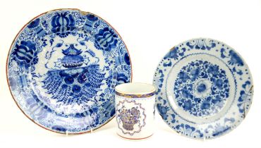 English Delft blue and white plate with floral design, monogrammed on the base MP 4/2 13,