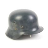German steel helmet the chin strap stamped 0/0750/0100