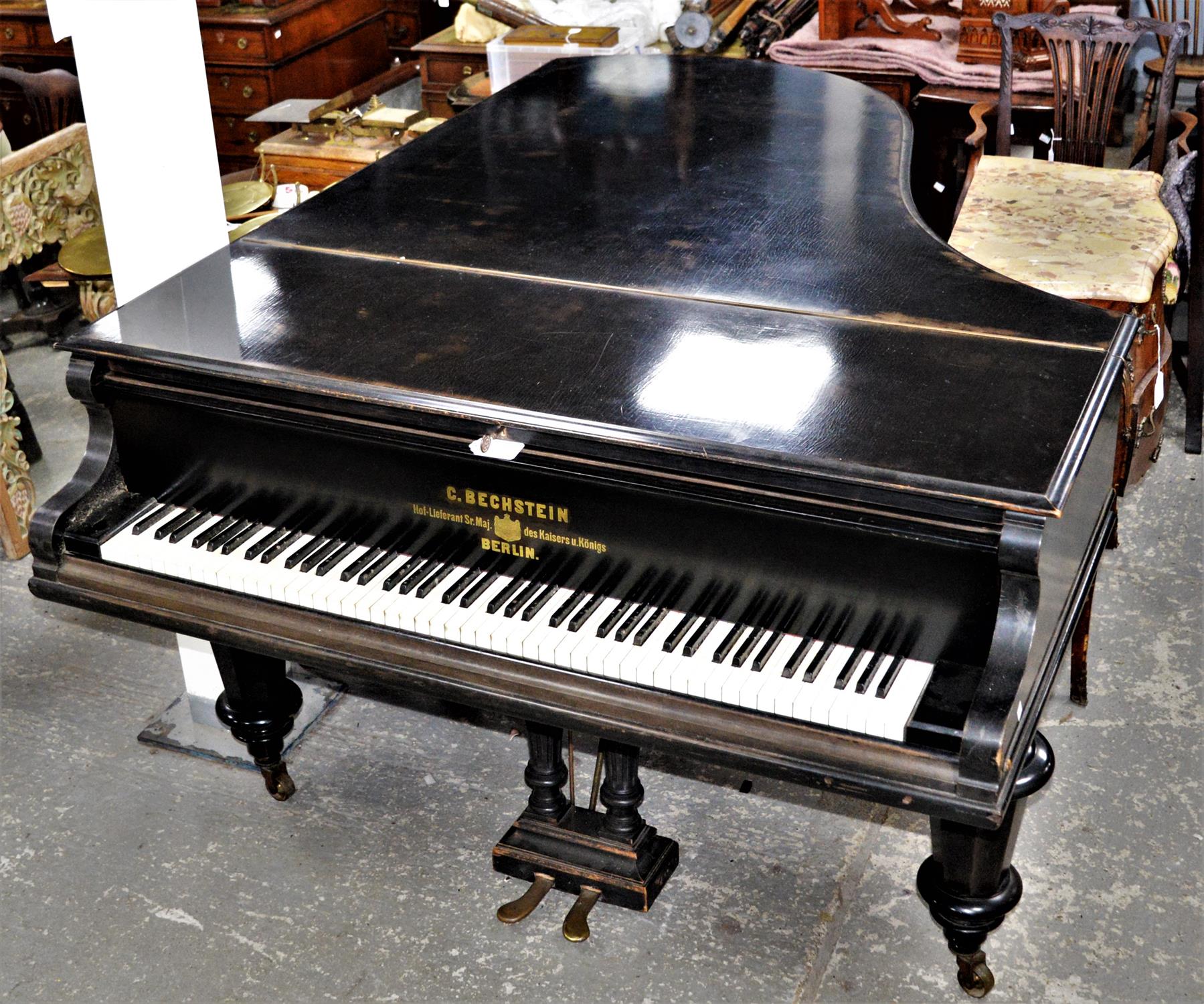 C Bechstein Model B grand piano, in an ebonised case with octagonal supports and castors.