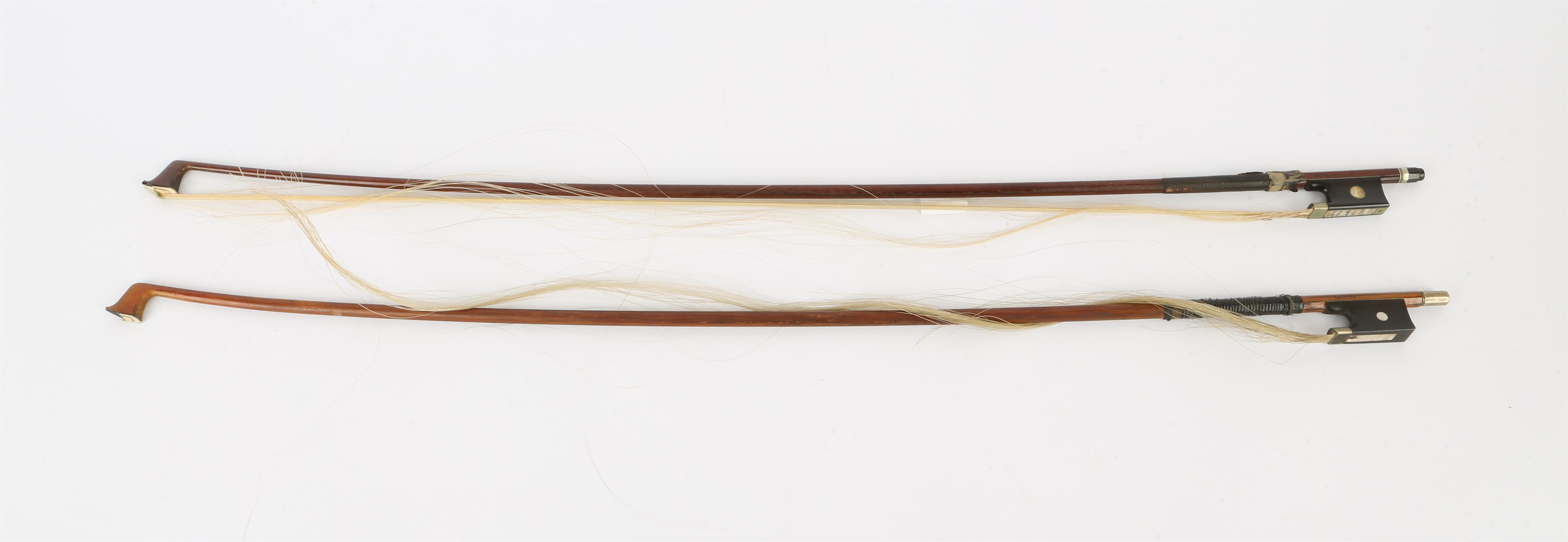 Violin bow stamped Vuillaume á Paris, round stick with ebony frog inlaid with pearl eyes and the - Image 2 of 2