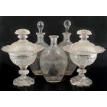 Pair of early 19th century cut glass comports with covers H24cm and three oval glass decanters (