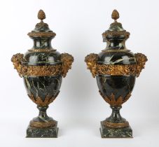 † Pair of French 19th century green marble and gilt metal mounted table top urns,