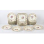 AMENDED DESCRIPTION Twenty-one Royal Copenhagen floral painted cabinet plates, with basket weave