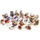 Large collection of Royal Crown Derby paper weights, mixture of gold and silver stoppers,