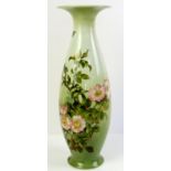 Doulton Lambeth vase, the green ground painted with roses, impressed, printed and hand painted