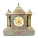 Victorian onyx mantel clock, of architectural form, the twin train movement striking on a gong,