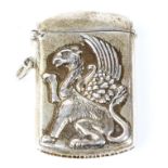 Silver vesta case with an embossed griffon/dragon figure to front and rear