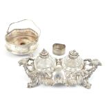 Victorian silver desk stand with foliate and C-Scroll decoration and two glass inkwells,