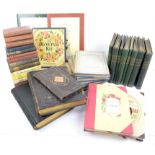 Two Victorian leather bound photo albums, further albums and a selection of vintage books