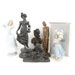 Art Deco style bronzed figure of a nude, patinated bronze figure of a child reading,