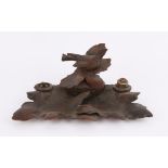 Late 19th/early 20th century inkstand carved with a bird and foliage,33 cms wide PROVENANCE; A
