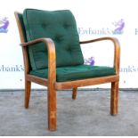 Attributed to Parker Knoll, a fruitwood armchair, circa 1930/1940, with long curving arms on square