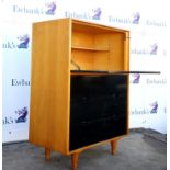 Ebonised wood and maple secretaire desk, circa 1930, with fall front enclosing an interior with a