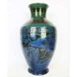 James Dewdney for the Branham Pottery, a large baluster vase, the peacock and floral design in a