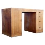 Heal’s walnut pedestal desk, of rectangular form, on twin pedestal support, one pedestal with