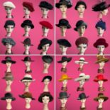 A large collection of about 40 ladies good quality, mostly designer winter hats dating from the