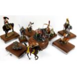 Eight cast metal soldier figures, to include Roman, medieval and Napoleonic, on integral stands,