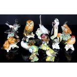 Goebel, Beswick, Mack, Royal Worcester porcelain bird groups( approx 40 )