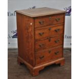 Early 20th century oak four drawer chest of small proportions on bracket feet H80cms