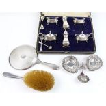 Six piece cruet set by the Goldsmiths and Silversmiths Company Ltd, comprising two mustard pots,