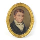 Nineteenth-century British School, oval portrait of a young man, oil on board, framed, 38 x 28cm,