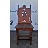 Metamorphic mahogany chair with gothic style back