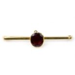 9 carat gold brooch mounted with single Garnet 2.57 grams