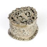 Victorian silver pot pourri box decorated with Putti figure and vacant heart cartouches by Haseler