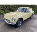1969 MGC GT. Registration number: LTU 274G - Finished in Primrose yellow, with full black leather