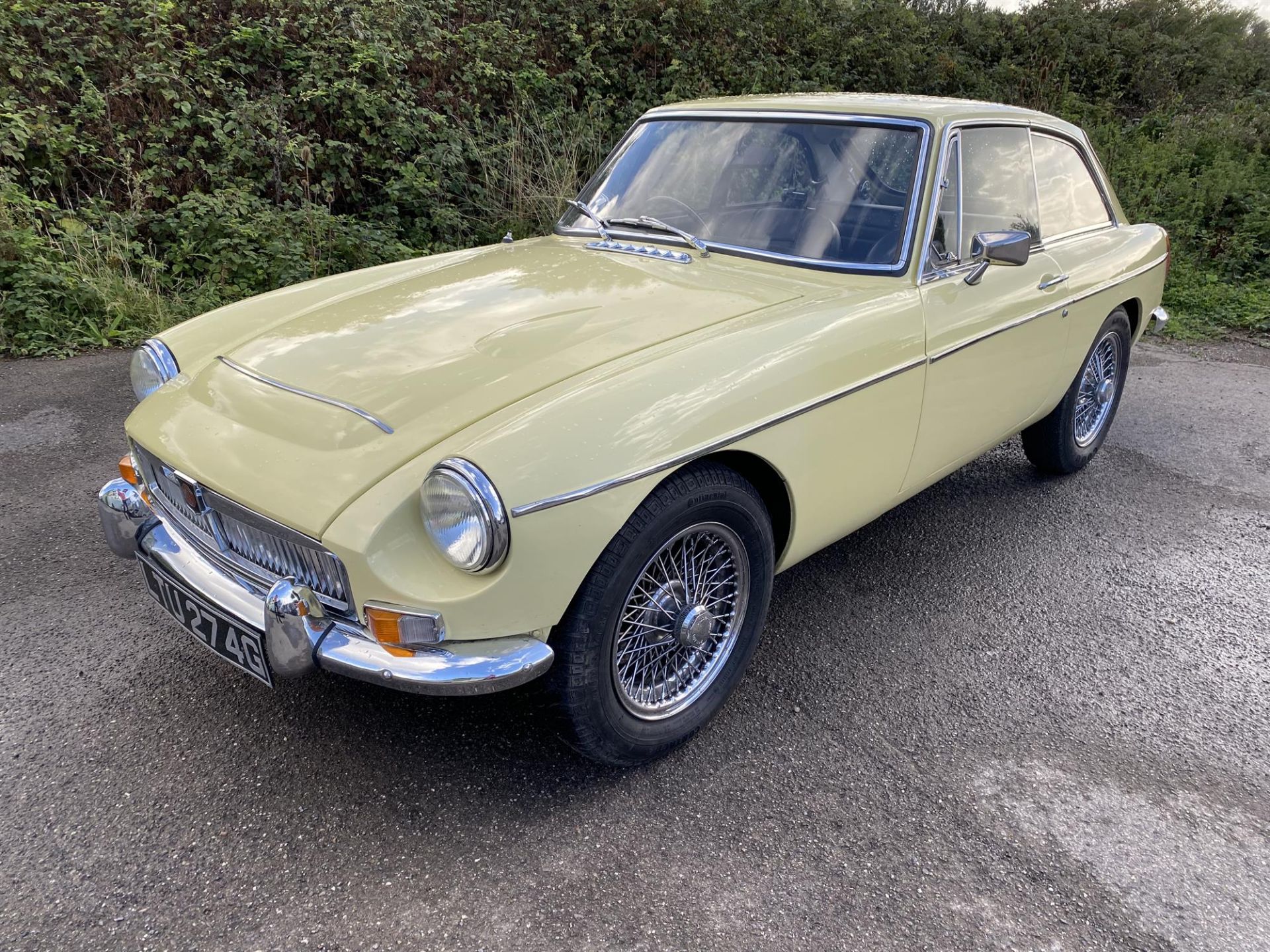 1969 MGC GT. Registration number: LTU 274G - Finished in Primrose yellow, with full black leather