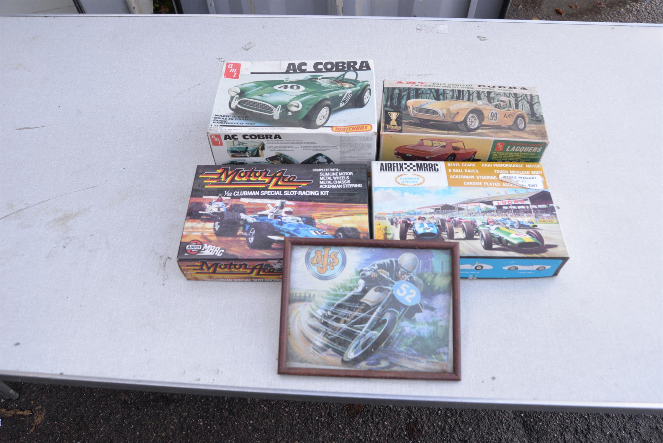 A selection of plastic model car kits.