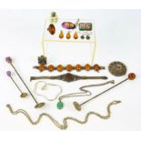 A group of silver jewellery, including a reconstituted amber bracelet, earrings and pendant,