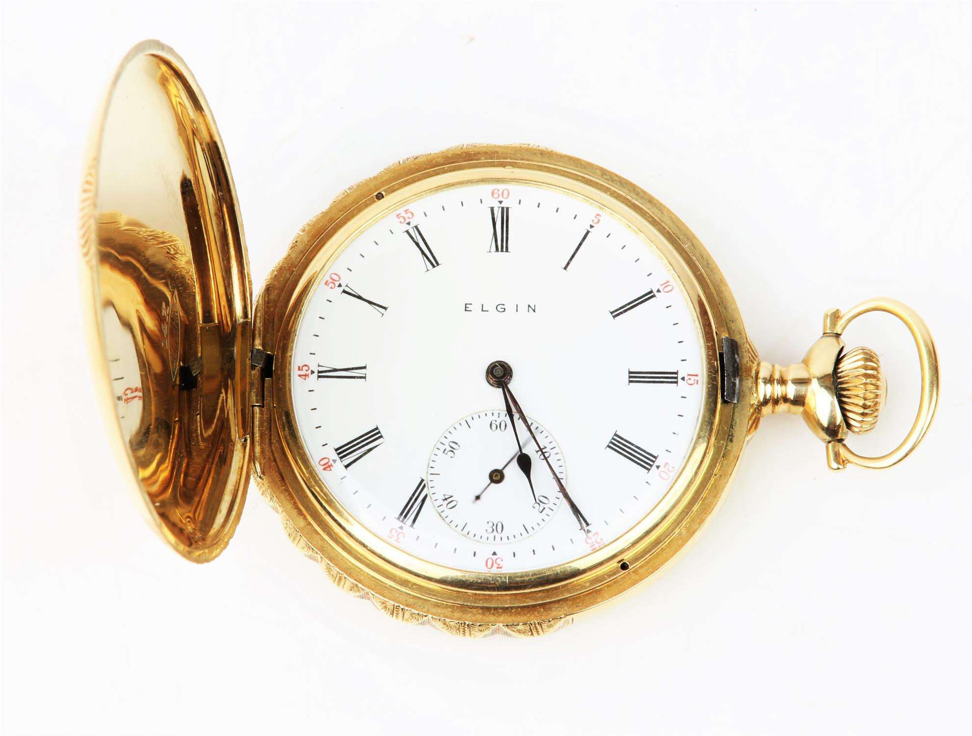 Elgin, a full hunter gold pocket watch, the case embossed with stags head and foliate reserve,