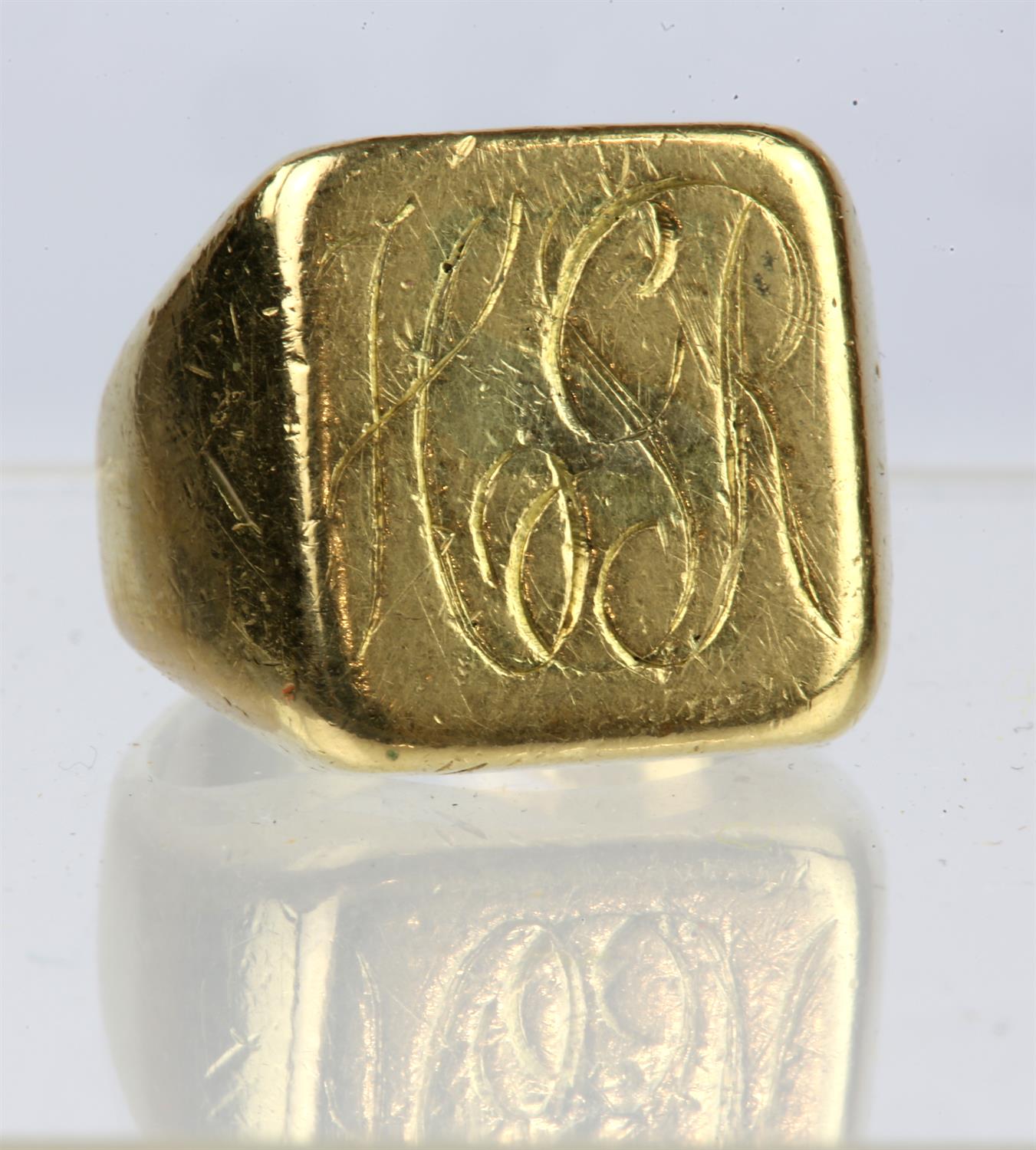 A heavy gold signet ring engraved with monogram HSR, mounted in stamped 18ct