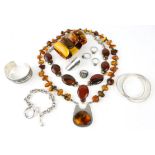 Amber necklace with large pendant set in silver, silver necklace with large agate stones and