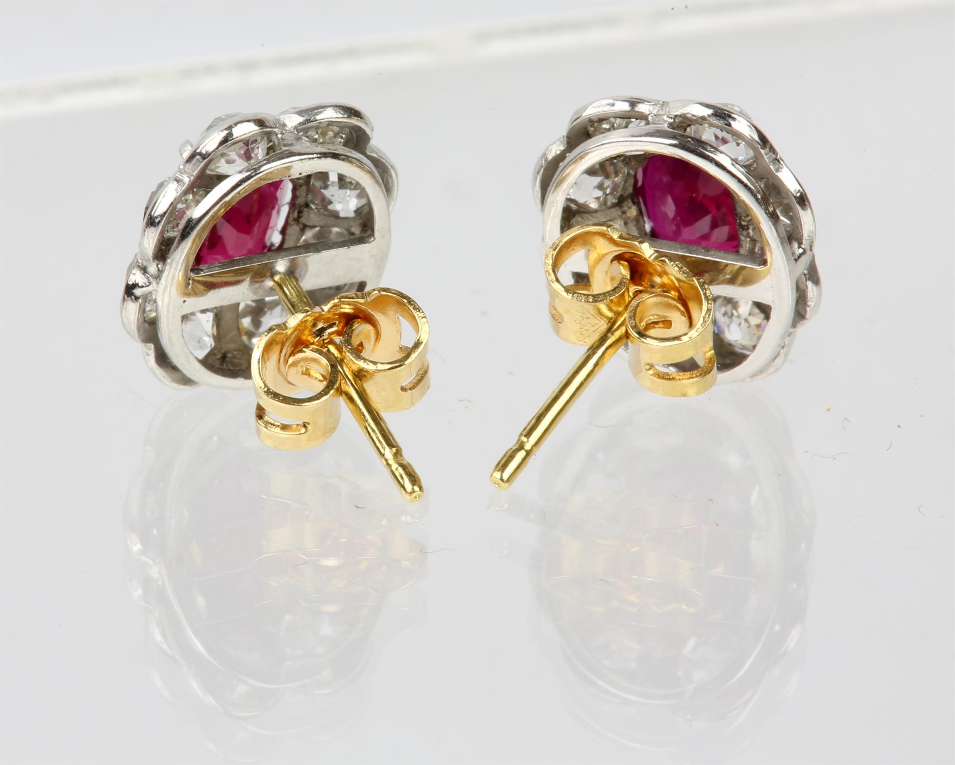 Ruby and diamond cluster earrings, each earring set with an oval cut ruby, estimated total ruby - Image 2 of 2